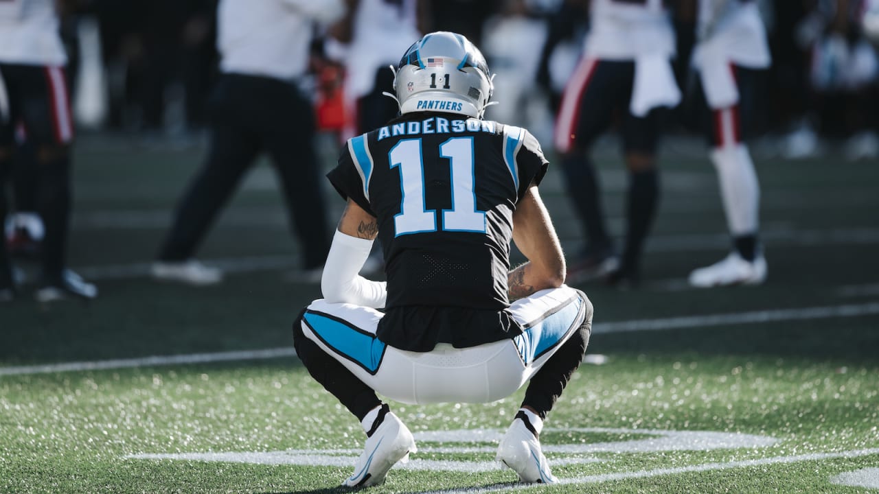 Michael Jordan of the Carolina Panthers stands on the sidelines