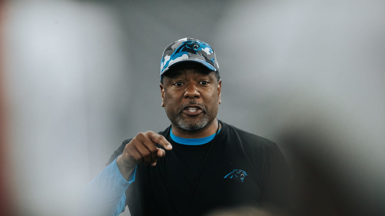 Derek Wright of the Carolina Panthers stands on the field before