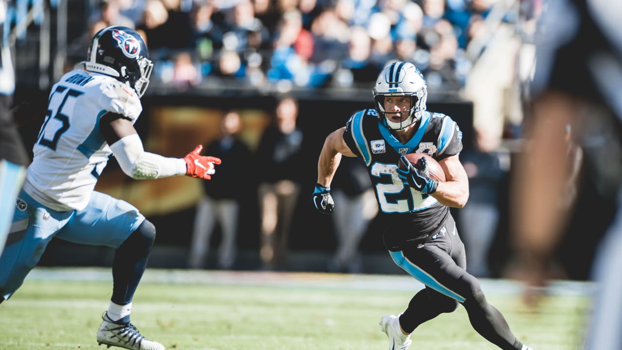 McCaffrey scores three touchdowns as Panthers beat Titans