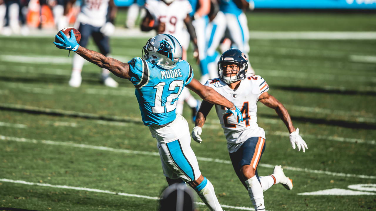 Carolina Panthers' DJ Moore (12) arrives for an NFL football