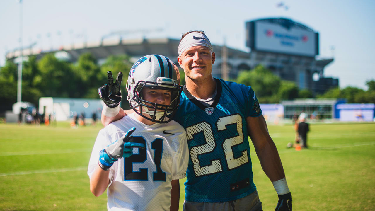 Christian McCaffrey helps grant the wish of a young Panthers fan