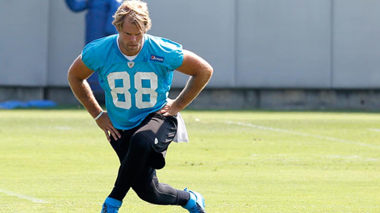 Greg Olsen, Christian McCaffrey compete to get loose