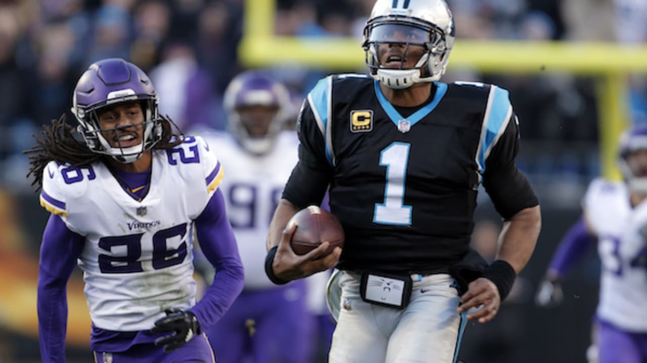 Cam Newton wears a fez before Sunday's game vs. Vikings