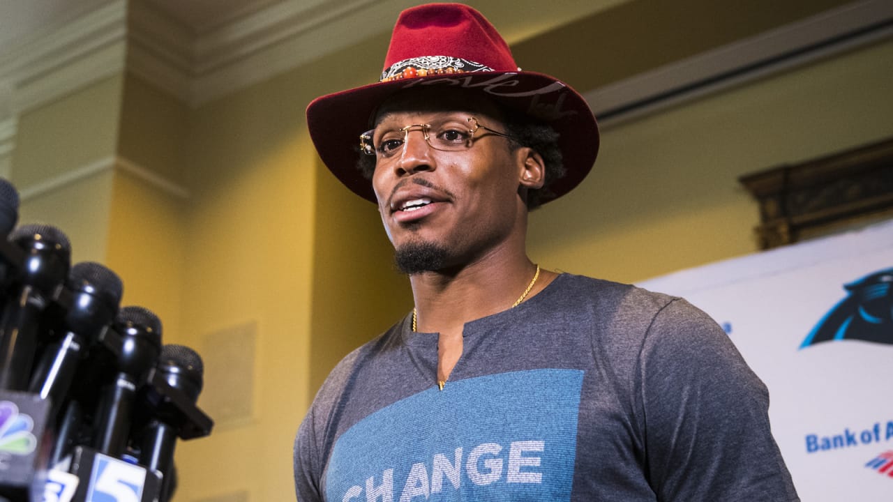 Cam Newton wore a huge hat and bleached beard to his first training camp  presser