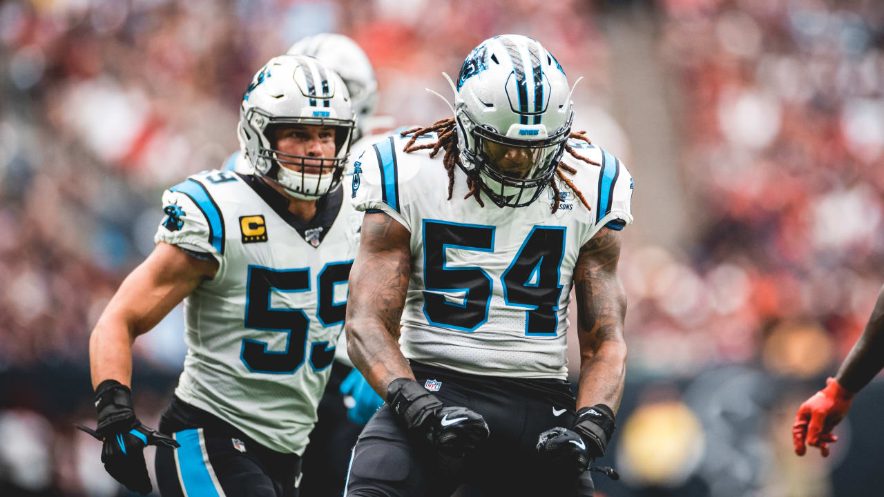 Carolina Panthers outside linebacker Shaq Thompson, right and