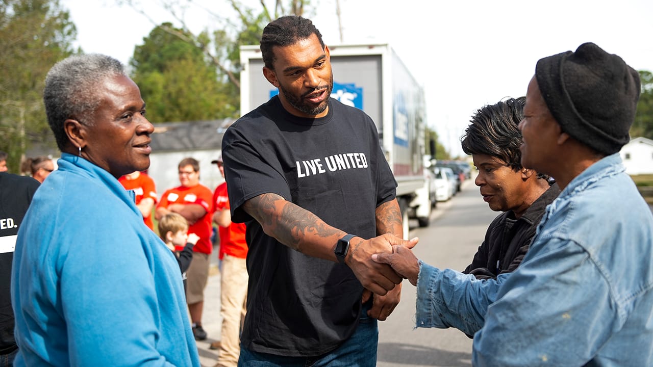 The tales of Julius Peppers: From hooping at UNC to knocking them