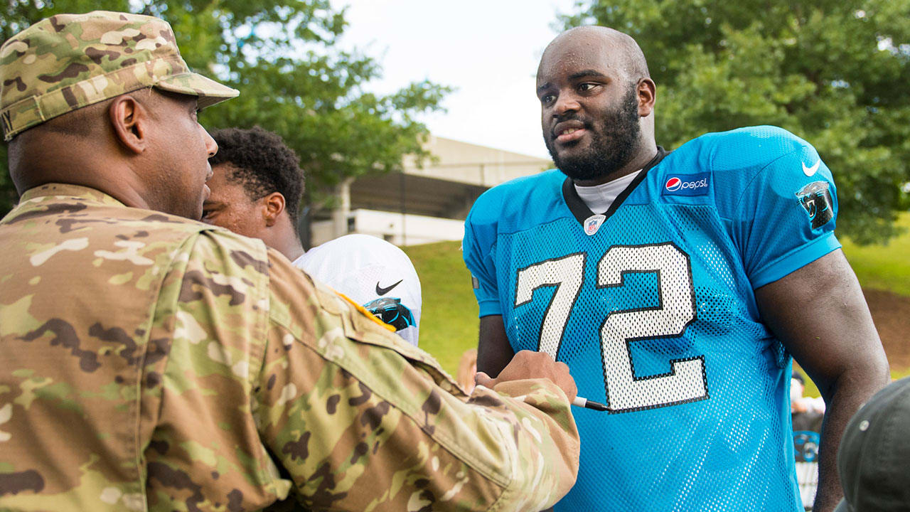 Players Marvel At Heroes In Uniform