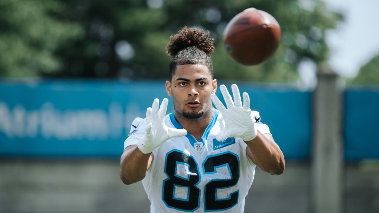 Tommy Tremble of the Carolina Panthers walks off the field