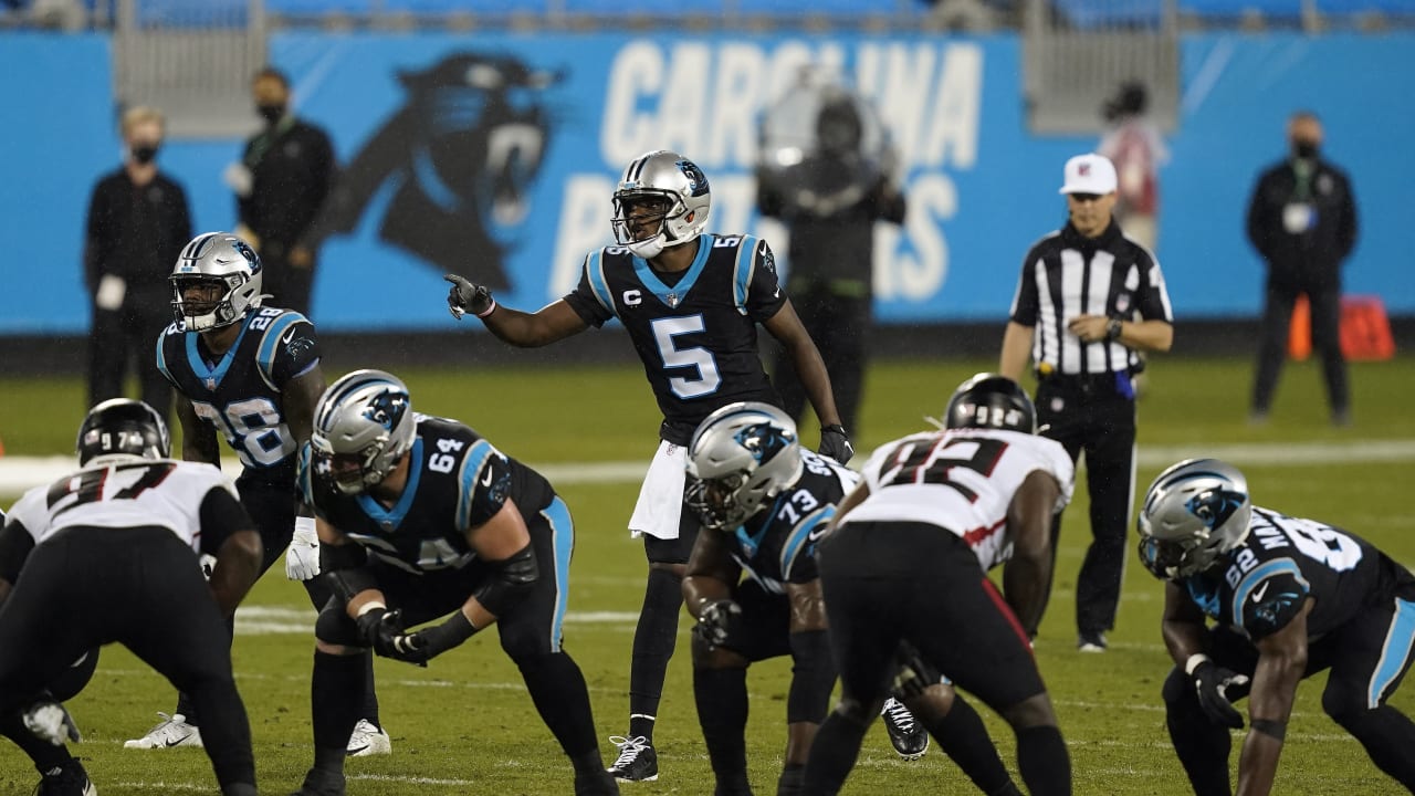 Photo: Carolina Panthers Jake Delhomme gets sacked in the third