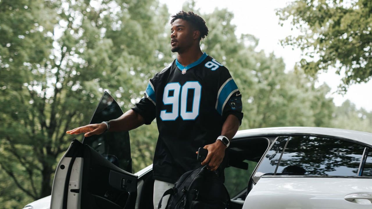 Jeremy Chinn arrives in Julius Peppers jersey