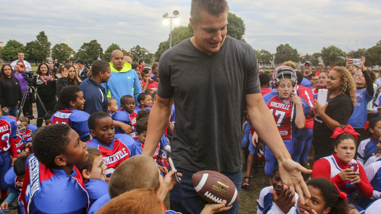 Gronkowski delivers donated football gear to youth of Somerville