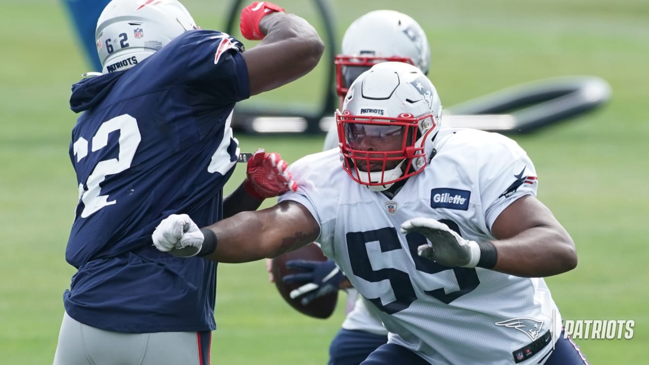 Patriots' Lawrence Guy on the field at training camp amid ongoing