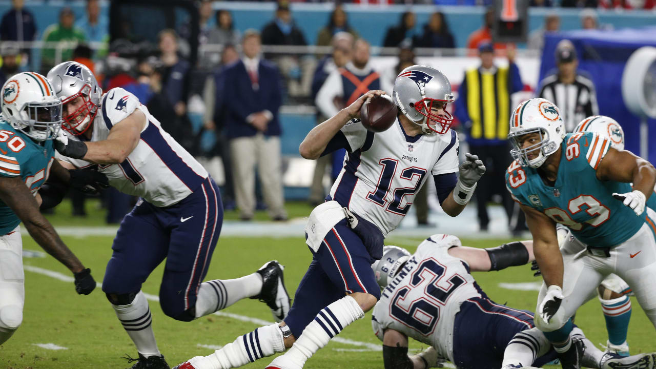 New England Patriots quarterback Tom Brady (12) gives a high five to  fullback James Develin (46) after a conversion in the fourth quarter  against the Minnesota Vikings at Gillette Stadium in Foxborough