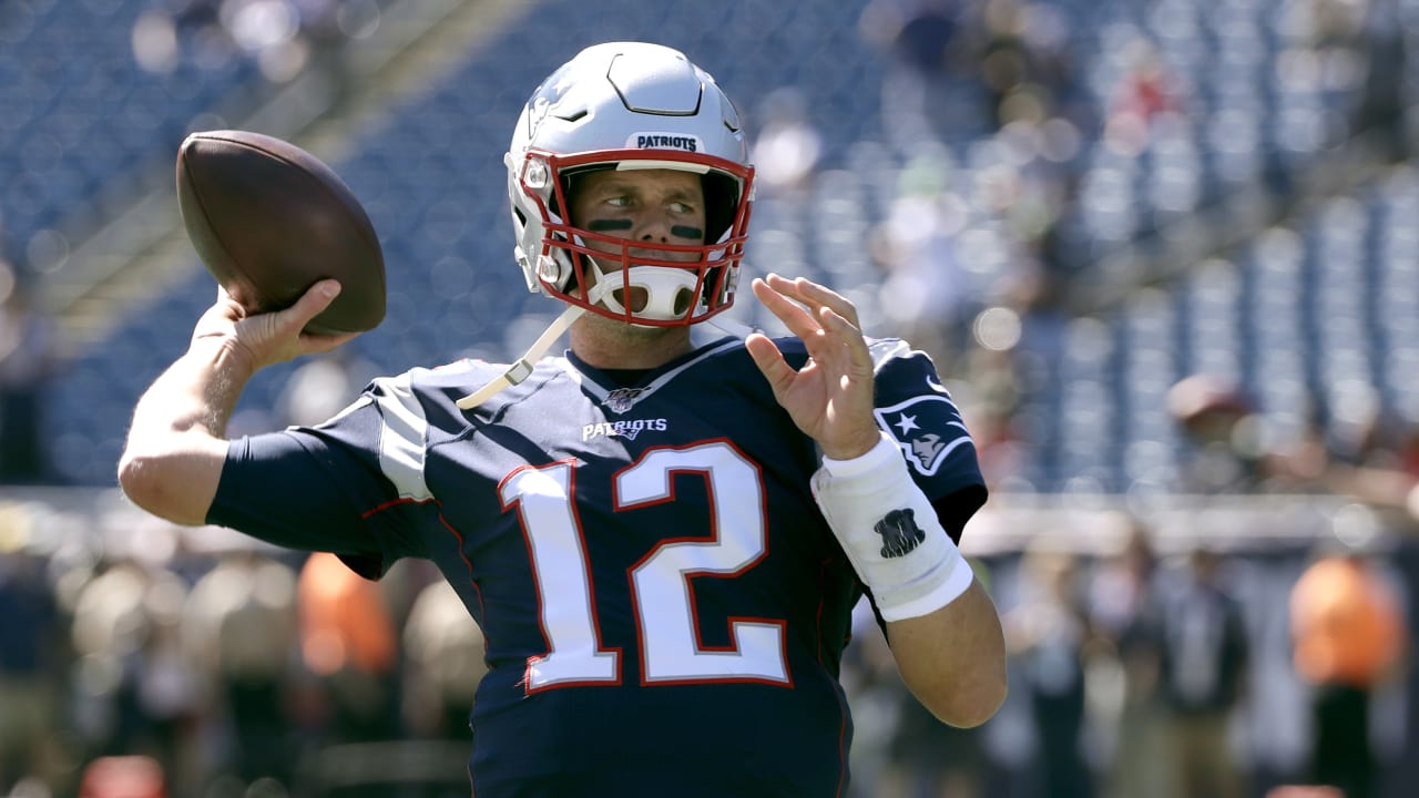 Brady sets completions record, throws 700th TD in OT win - The San