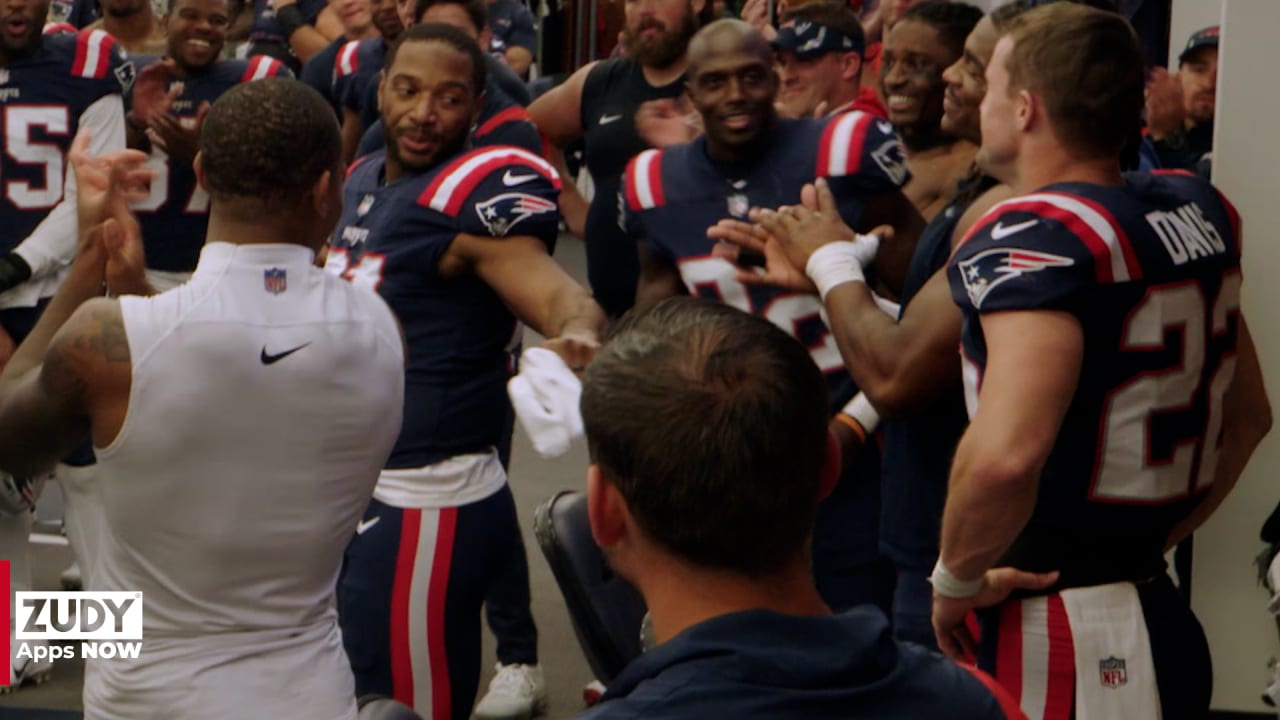 Locker room celebration after comeback victory vs. Raiders