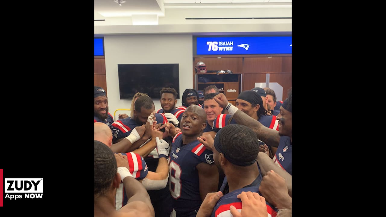 Locker room celebration after comeback victory vs. Raiders