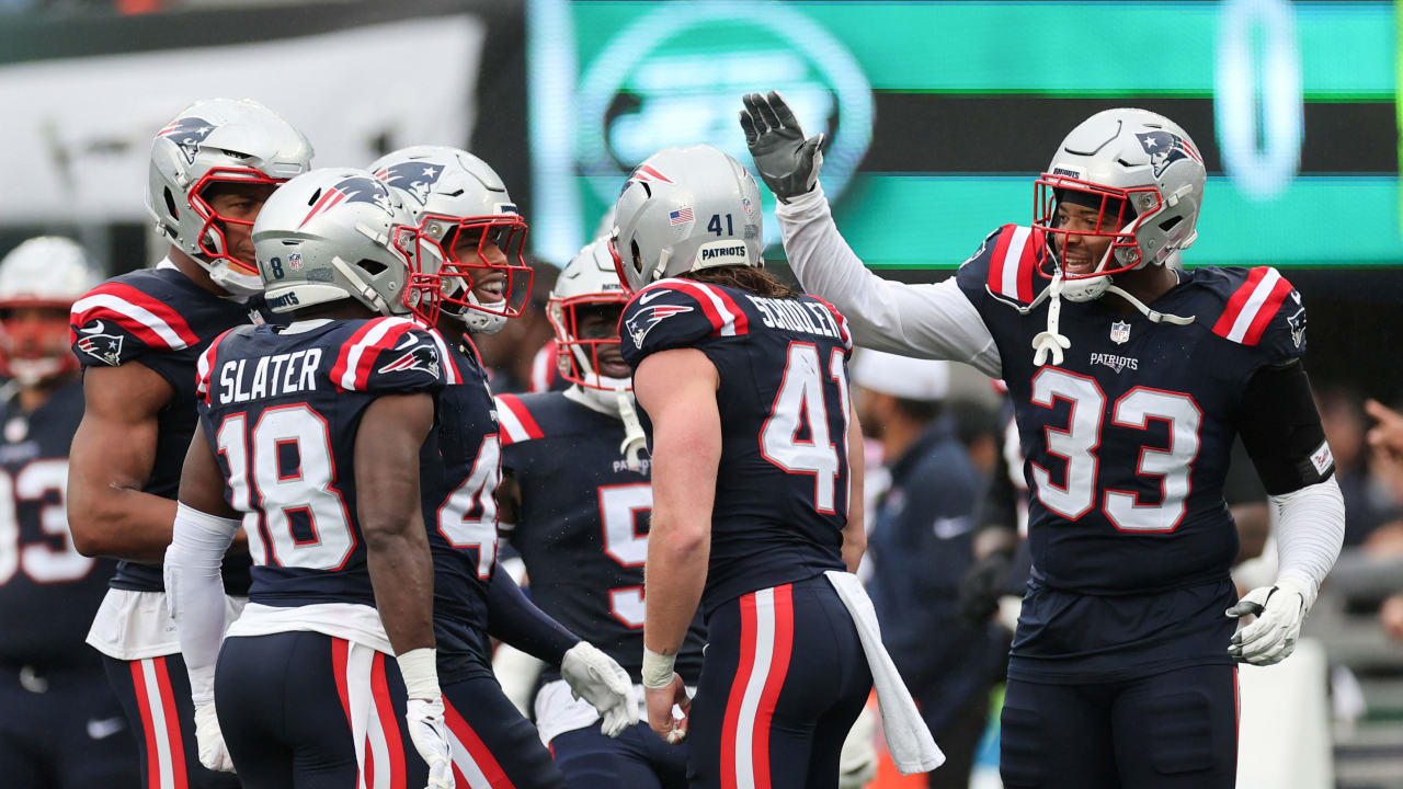 New England Patriots running back Ezekiel Elliott (15) walks on the field  during the first half of a preseason NFL football game against the New  England Patriots Saturday, Aug. 19, 2023, in