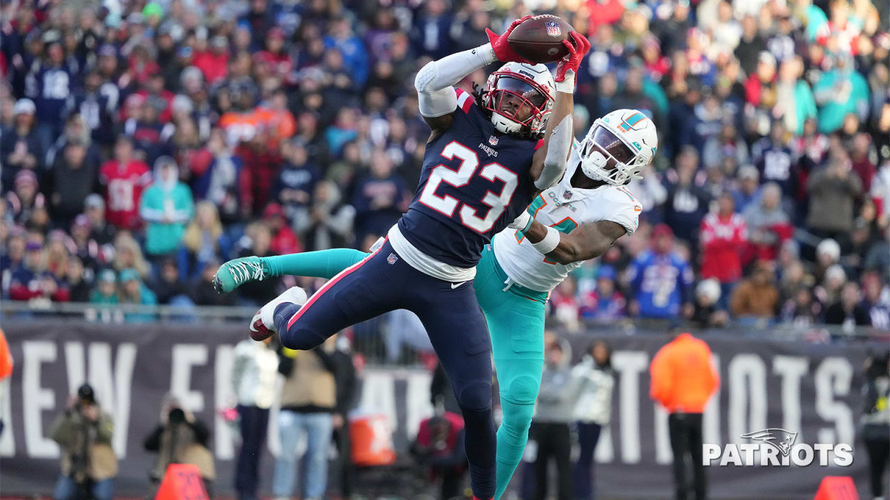 Dugger interception return helps Patriots beat Dolphins 23-21