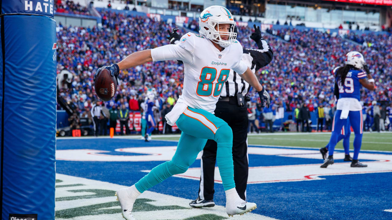 Miami Dolphins tight end Mike Gesicki (88) runs on the field