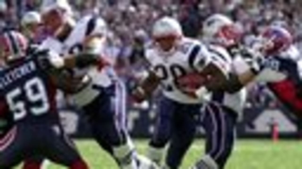 New England Patriots running back Corey Dillon gains yards against