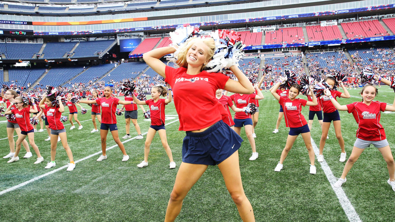 BOSTON - OCTOBER 16: New England Patriots Cheerleader Cheers With