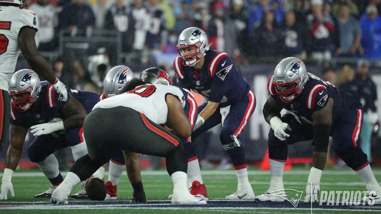 New England Patriots fullback Jakob Johnson, right, dives for the ball  against Tampa Bay Buccaneers cornerback Rashard Robinson (28) during the  second half of an NFL football game, Sunday, Oct. 3, 2021