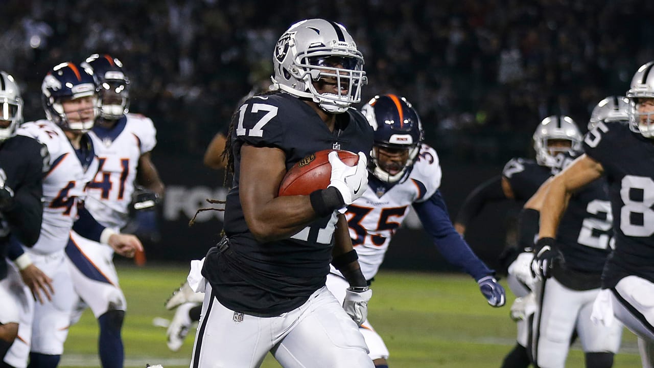 Oakland Raiders' Dwayne Harris (17) returns a punt for a touchdown against  the Denver Broncos during the first half of an NFL football game in Oakland,  Calif., Monday, Dec. 24, 2018. (AP