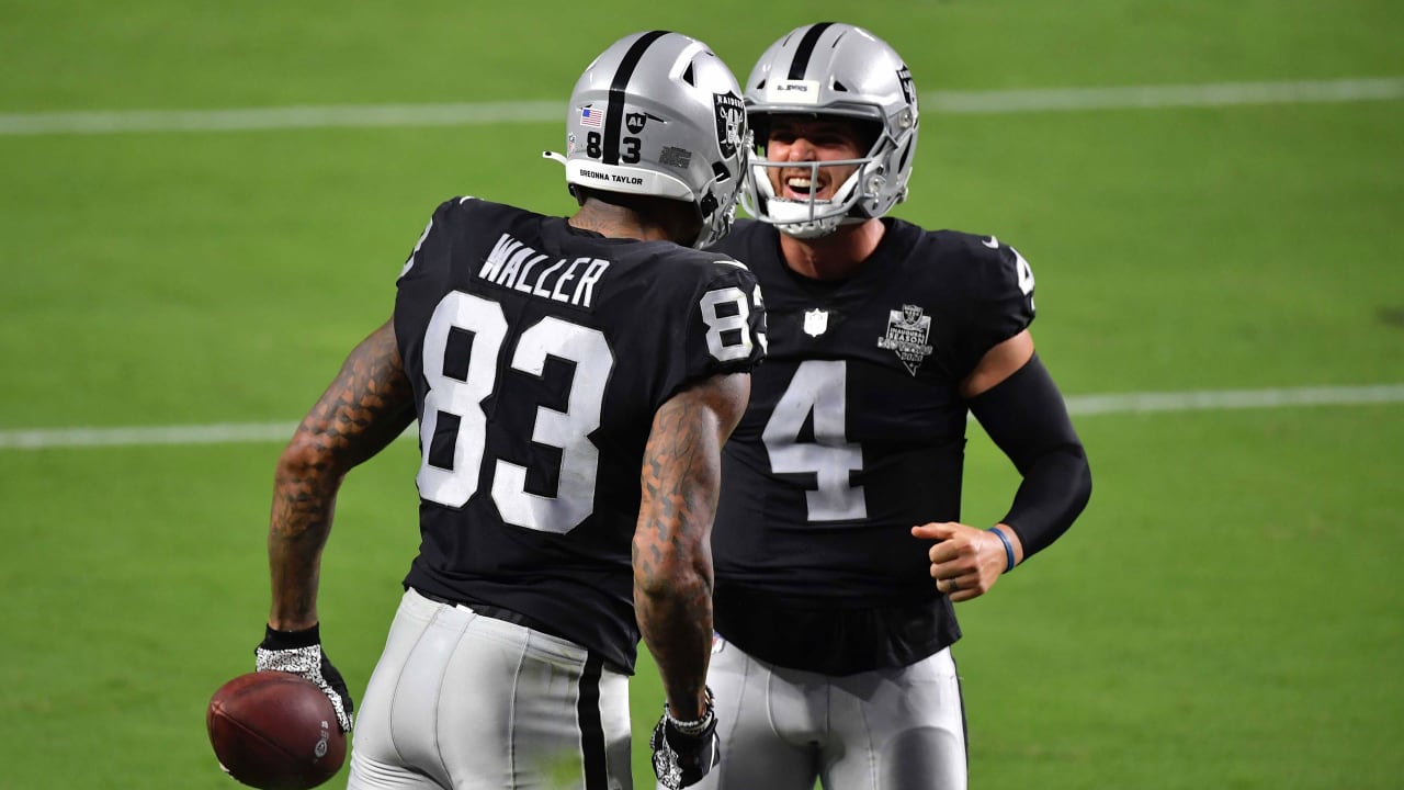 Darren Waller of the Las Vegas Raiders celebrates a touchdown with