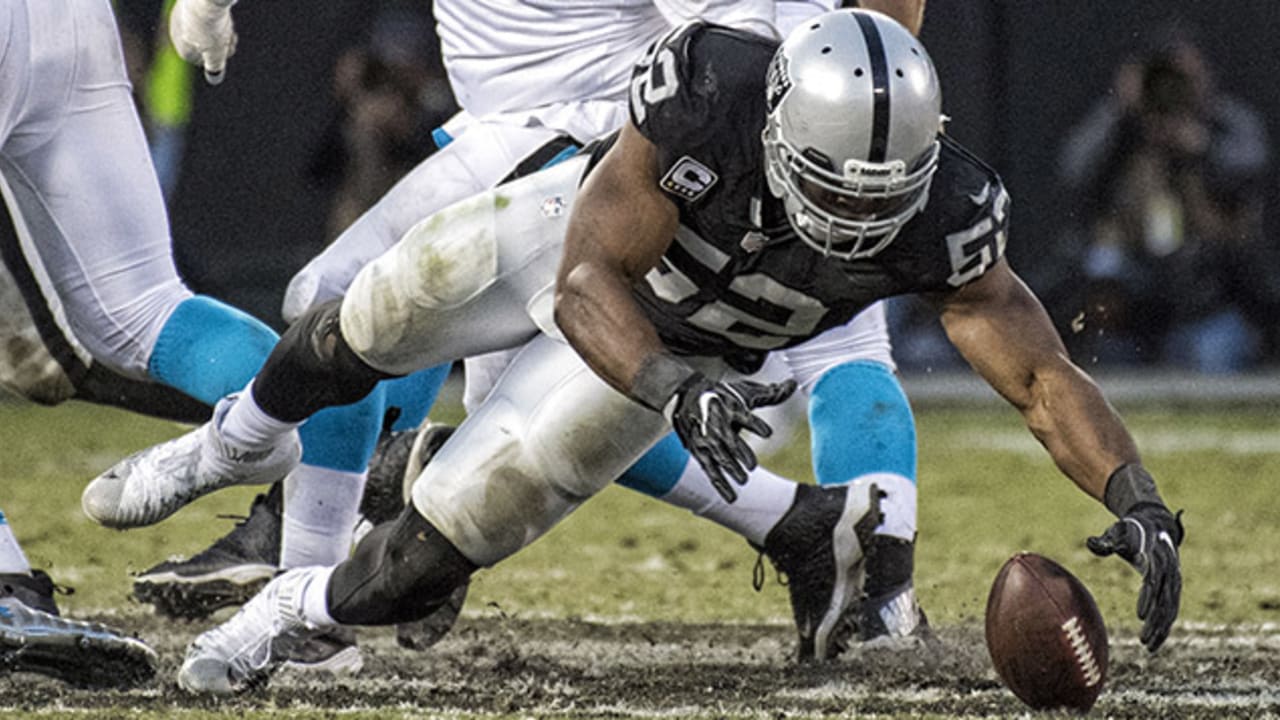 Oakland Raiders defensive end Khalil Mack (52) stretches during