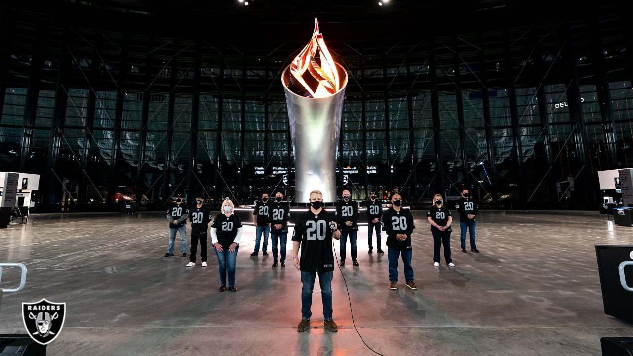 Founding PSL holders light Al Davis Memorial Torch