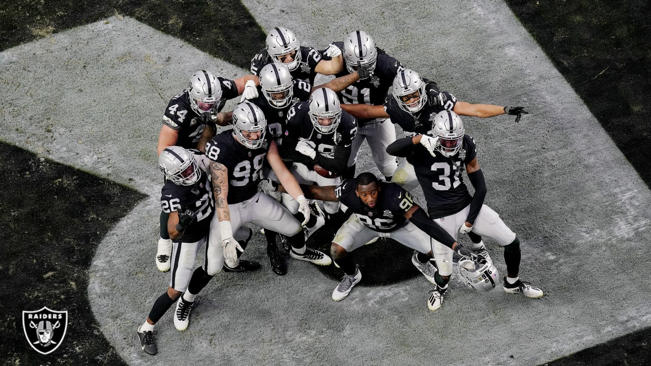 Oakland Raiders defensive back Erik Harris (25) holds onto the ball after  intercepting a pass against