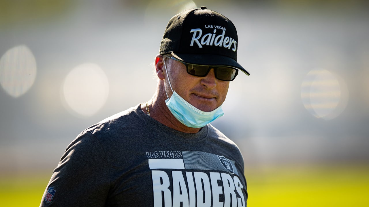 Las Vegas Raiders tight end Jason Witten talks with a coach at the bench  during an NFL football game against the New England Patriots at Gillette  Stadium, Sunday, Sept. 27, 2020 in