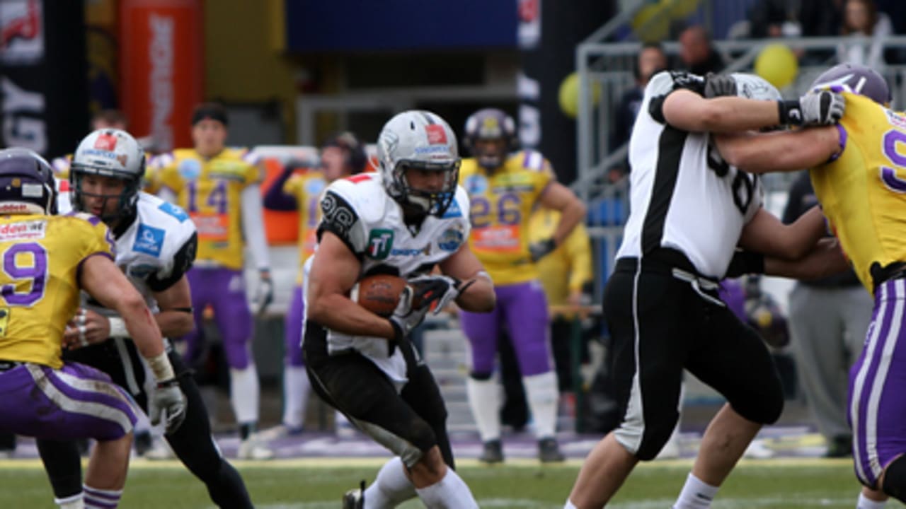 American football, RB Dusty Thornhill, No. 2 Vikings, is tackled