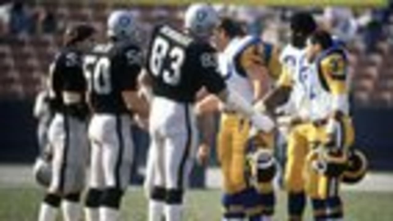 Quarterback Jim Plunkett of the Los Angeles Raiders drops back to