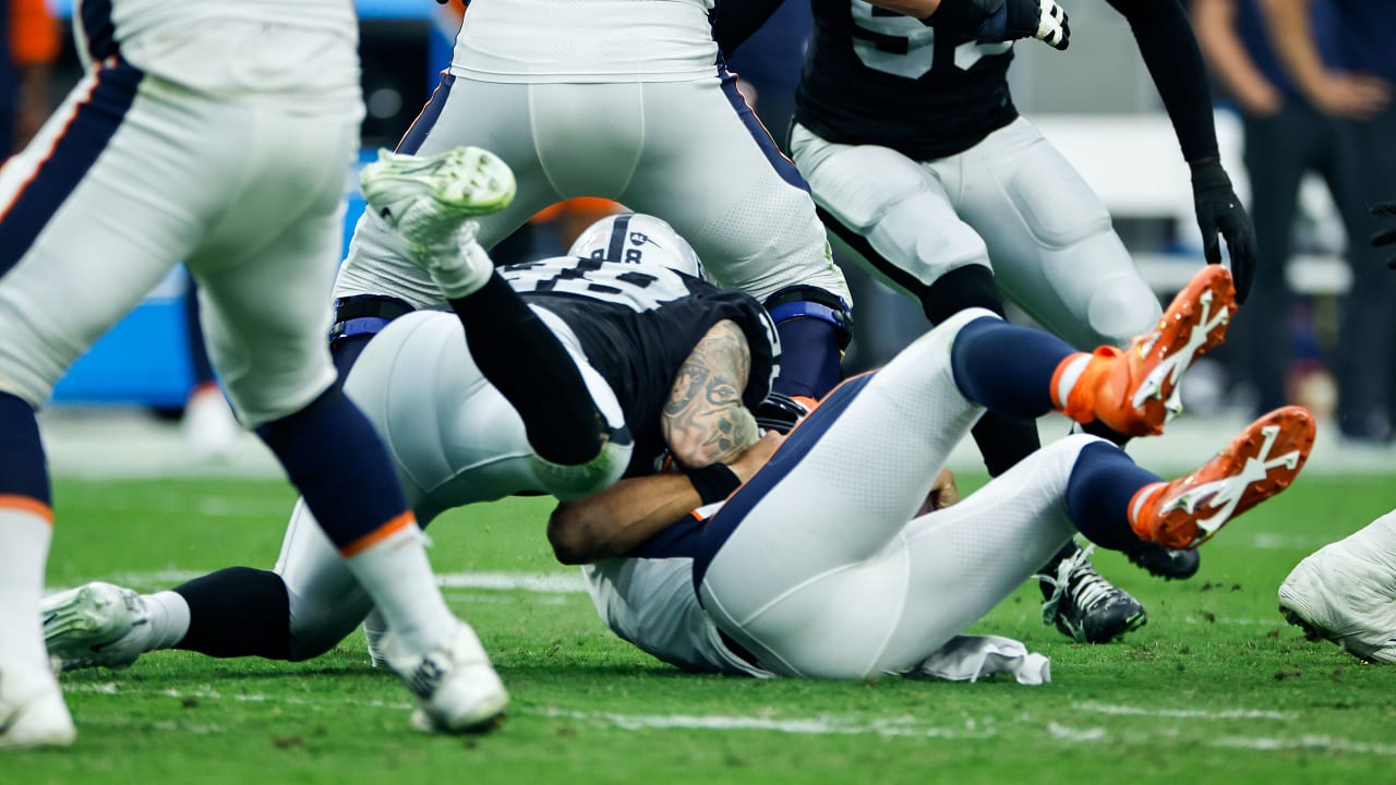 Reviewing the defensive line's performance containing Broncos quarterback  Russell Wilson, Raiders Review