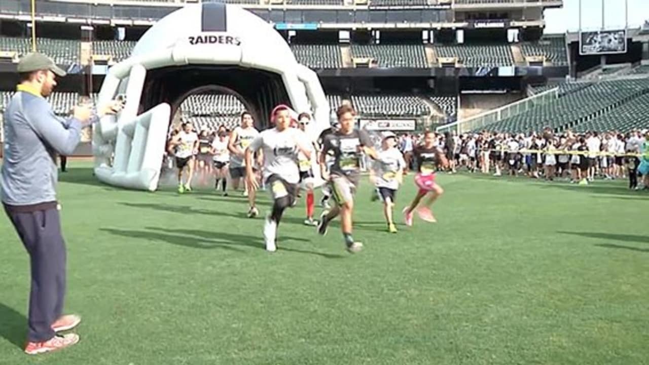 Raiders Hold Back to Football 5K