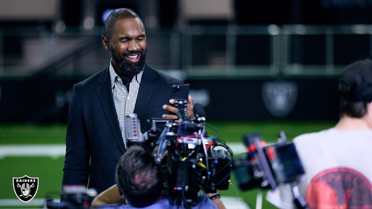 Oakland Raiders Charles Woodson (24) goes high to intercept a