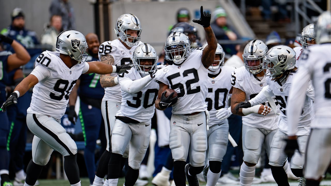 Las Vegas Raiders safety Duron Harmon celebrates his interception with  defensive end Maxx Crosby during an NFL football game against the Seattle  Seahawks, Sunday, Nov. 27, 2022, in Seattle.The Raiders won 40-34