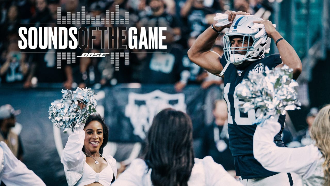 Oakland Raiders fans cheer during an NFL game against the Los