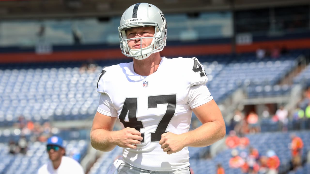 A view of the back of the Raiders helmet worn by Las Vegas Raiders long  snapper Trent Sieg (47) …