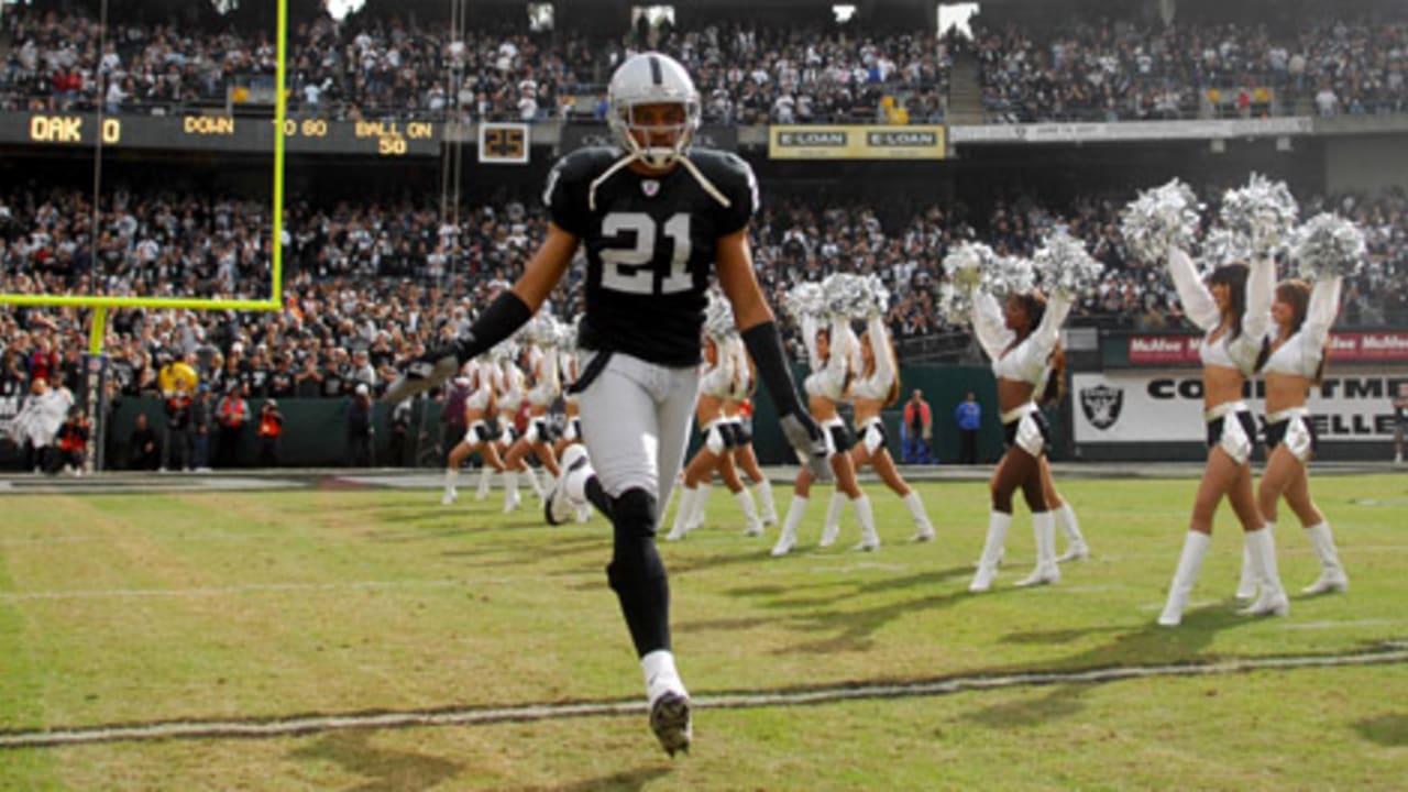 Oakland Raiders quarterback Charlie Frye (3) is sacked by