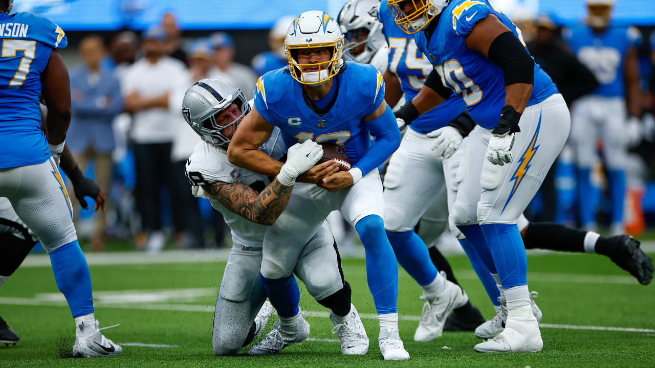 Las Vegas Raiders running back Josh Jacobs (28) gains yards on a run during  an NFL football game against the Los Angeles Chargers, Sunday, September  11, 2022 in Inglewood, Calif. The Chargers