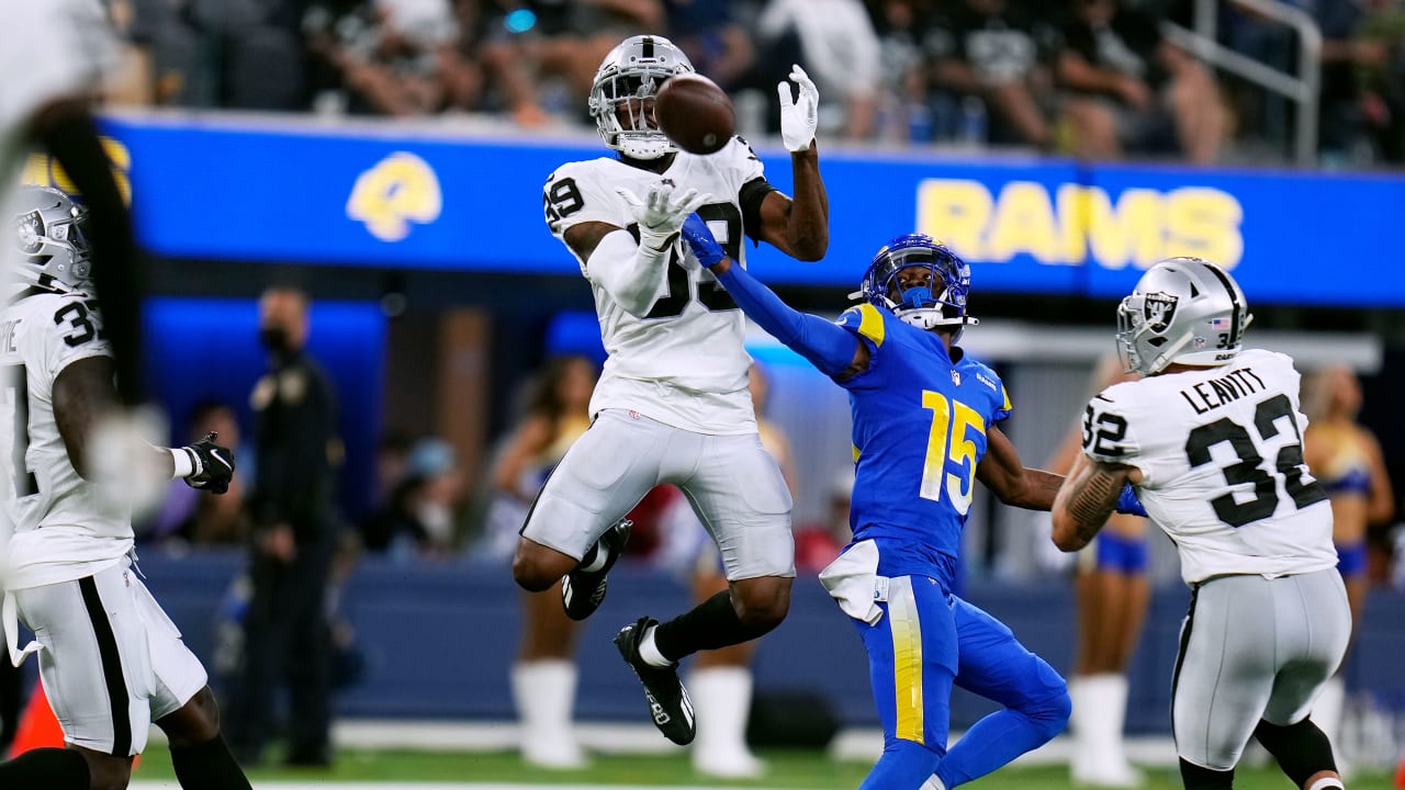 Nate Hobbs and Defense after interception. (Credit Hoku via