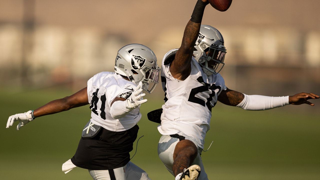 Las Vegas Raiders cornerback Damon Arnette (20) and cornerback Keisean  Nixon (22) celebrate fol …