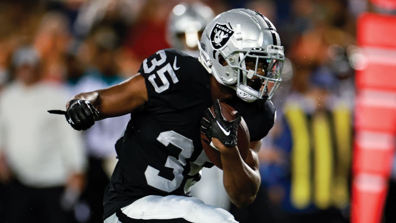 Running back Zamir White of the Las Vegas Raiders runs for first