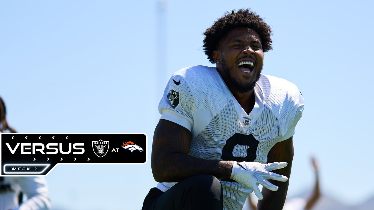 Las Vegas Raiders running back Josh Jacobs (28) smiles as he walks toward  the bench in the 4th …