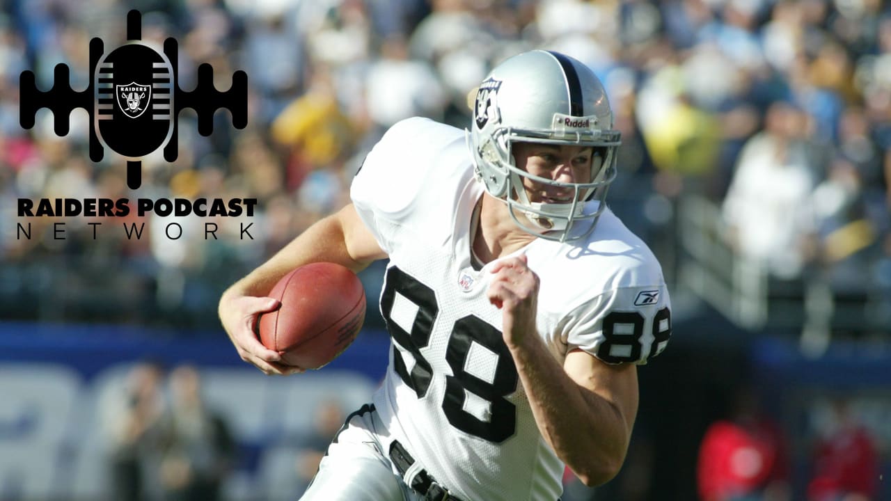 Oakland Raiders linebacker Bill Romanowski runs with the football