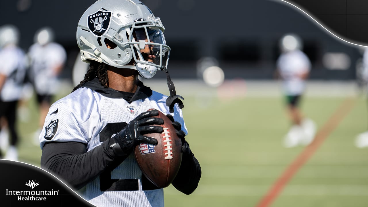 Raiders wide receiver DJ Turner (19) is tackled by Seattle Seahawks  cornerback Tre Brown (22) i …