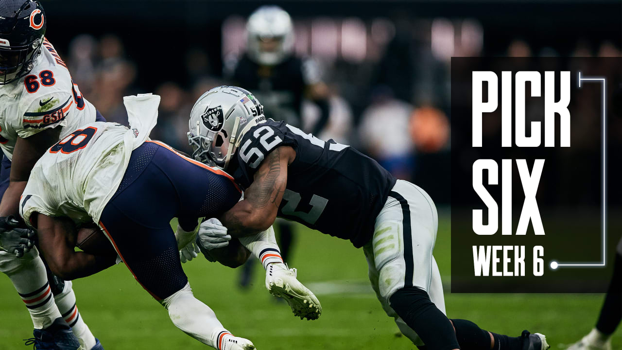 Los Angeles, USA. October 07, 2018 Los Angeles Chargers running back Melvin  Gordon (28) carries the ball as Oakland Raiders linebacker Tahir Whitehead  (59) makes the tackle during the football game between