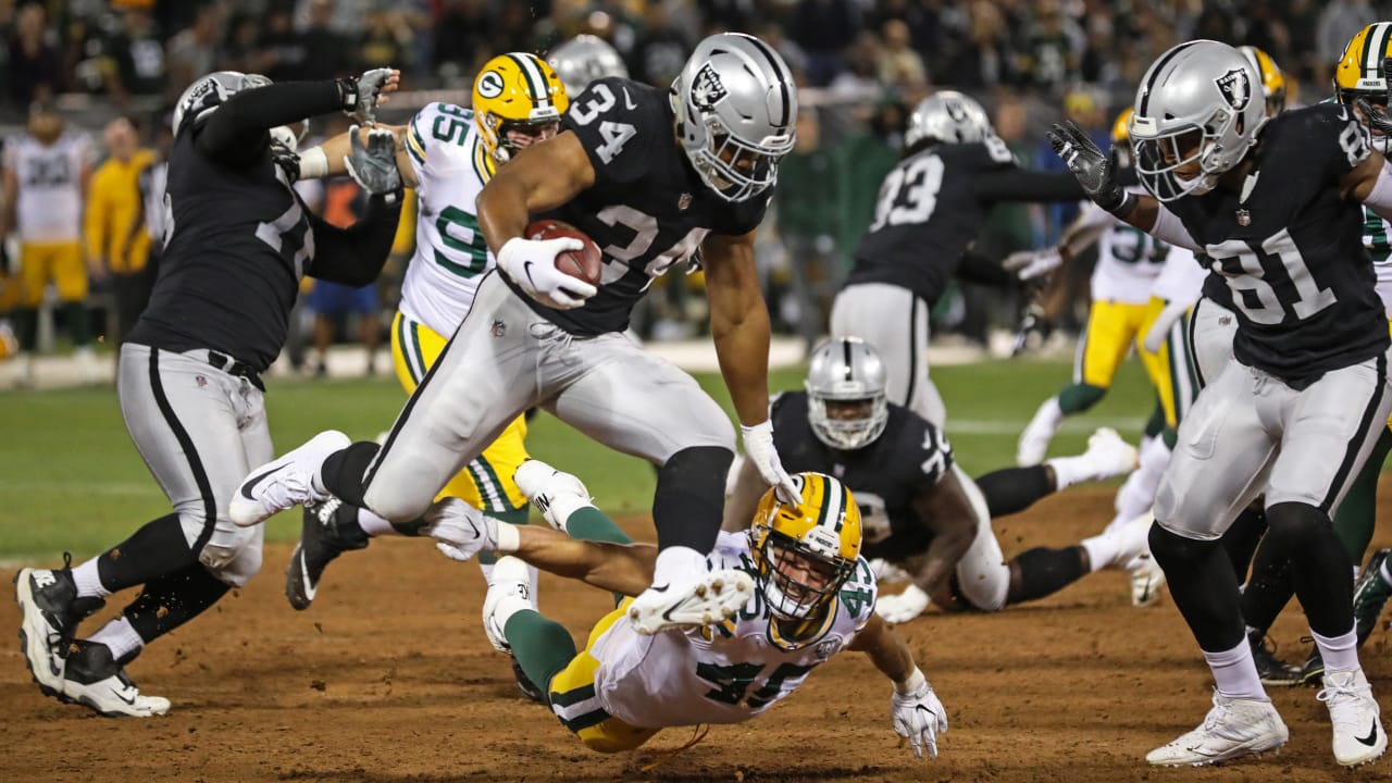 RB Chris Warren III powers his way into the end zone for first TD